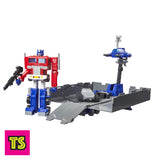 Transformed Robot Mode with Trailer Command Base and Rolly, Optimus Prime (Cartoon Colors) 40th Anniversary Edition, Transformers by Hasbro 2024 | ToySack, buy Transformers toys for sale online at ToySack
